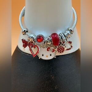 Hello Kitty Silver and Red Charm Bracelet with Playful Accents Adjustable Band